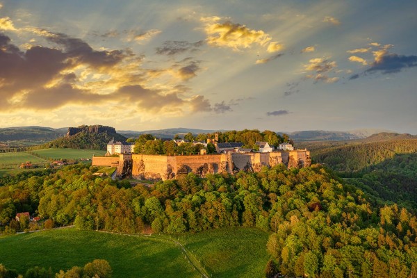 Wandbild Sächsische Schweiz - Sonnenuntergang über der Festung Königstein (Motiv DMSZ11)